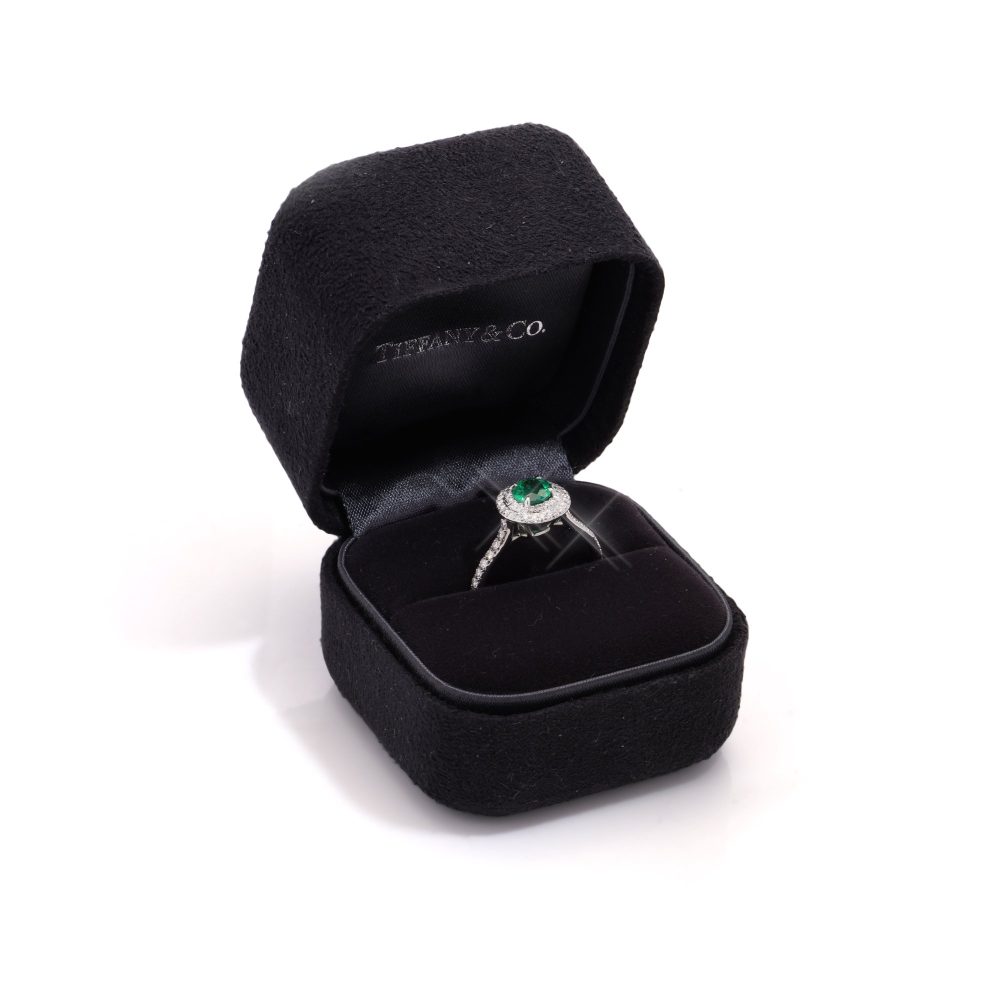 Tiffany & Co ladies emerald and diamond ring in platinum.