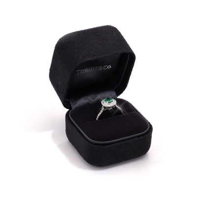 Tiffany & Co ladies emerald and diamond ring in platinum.