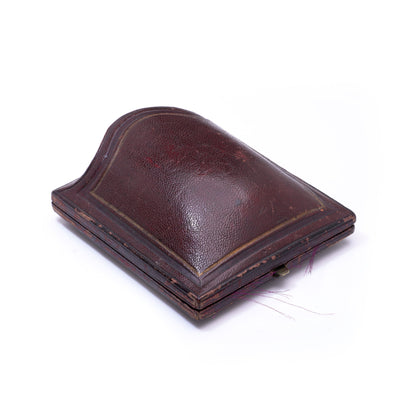 An antique leather case, on a white background