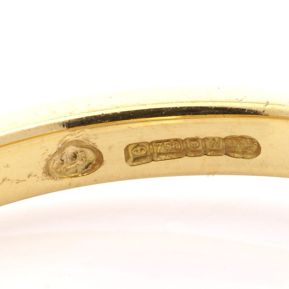 Ruby and diamond ring set in 18 ct gold