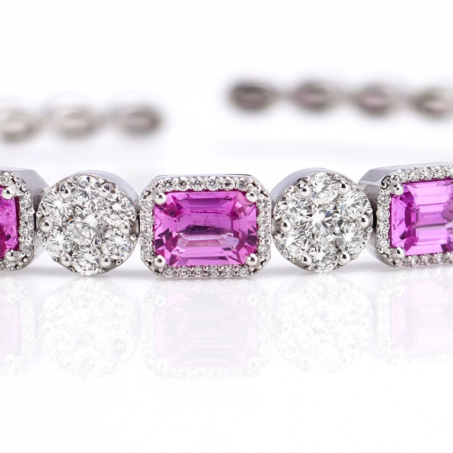 18 Carat White Gold Bangle With Natural Pink Sapphires And Diamonds