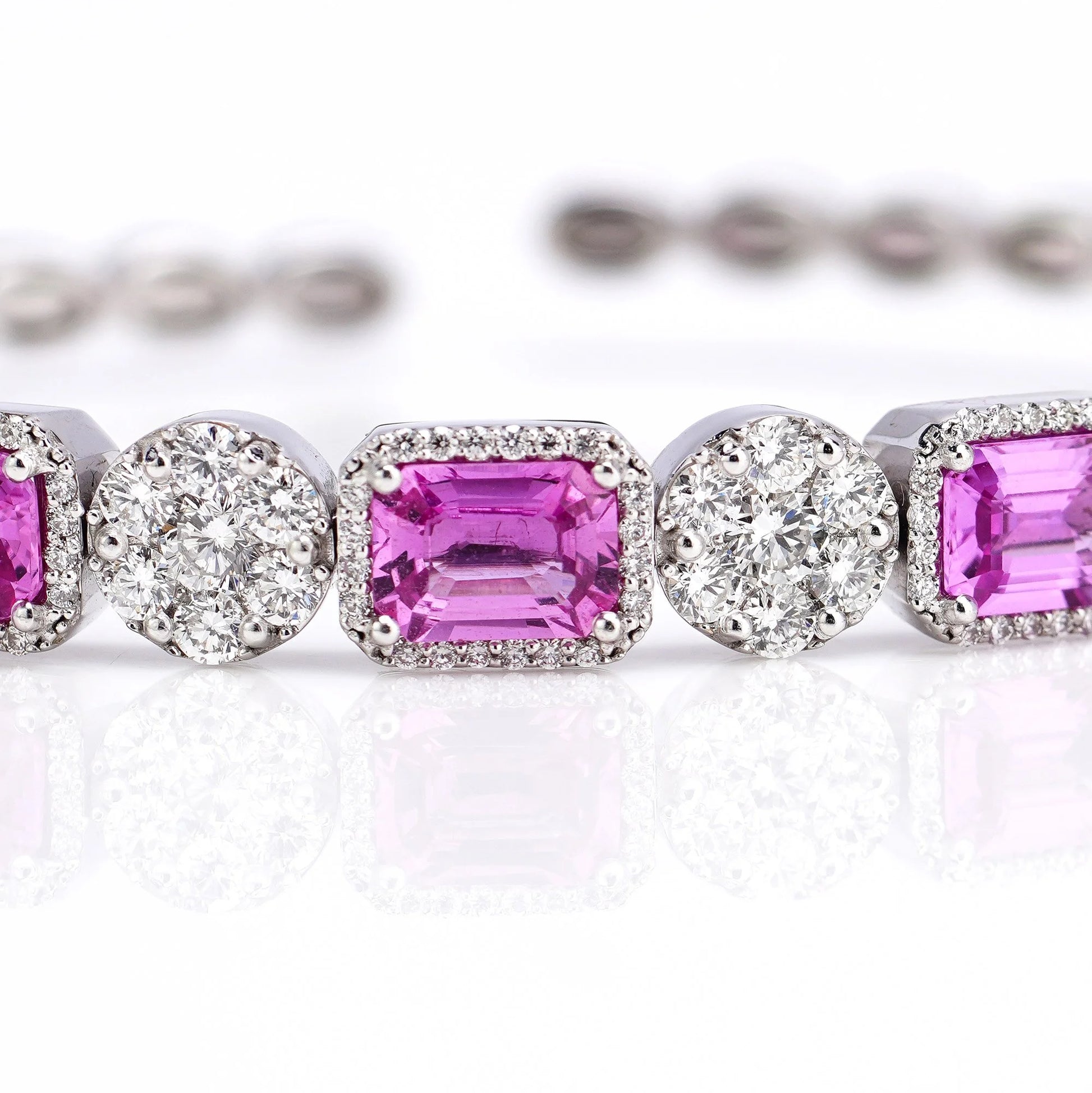 18 Carat White Gold Bangle With Natural Pink Sapphires And Diamonds