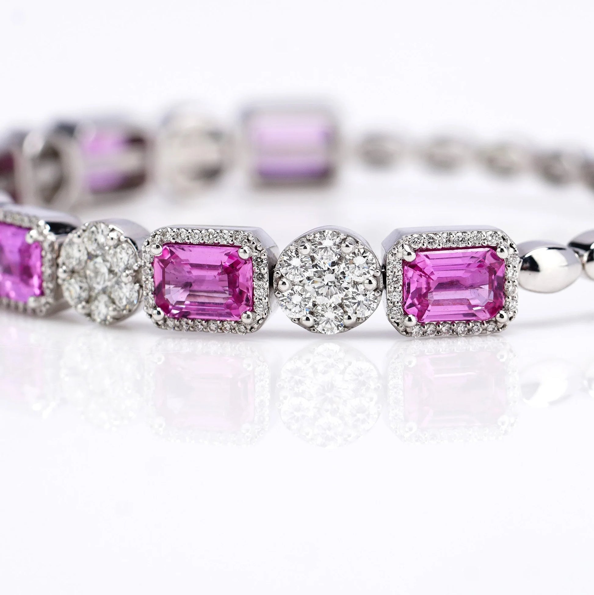 18 Carat White Gold Bangle With Natural Pink Sapphires And Diamonds