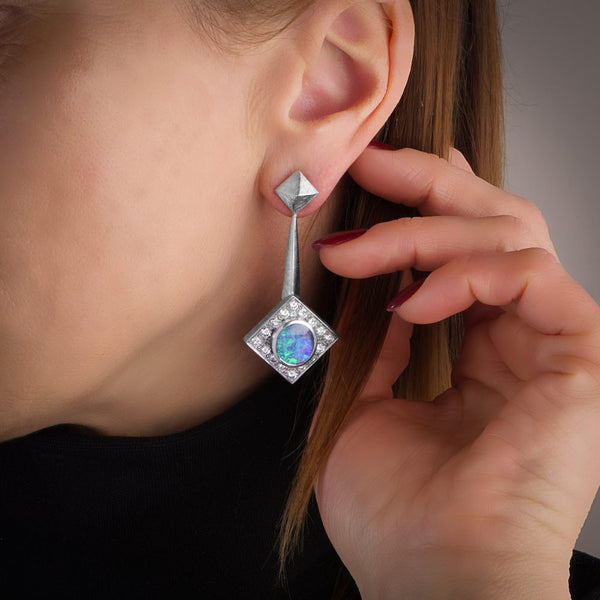 Opal and diamond earrings in white gold.