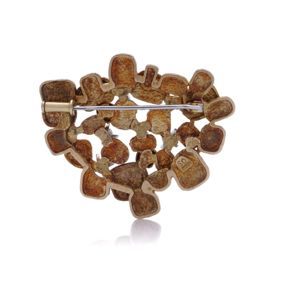 Vintage gold textured petal design diamond brooch.