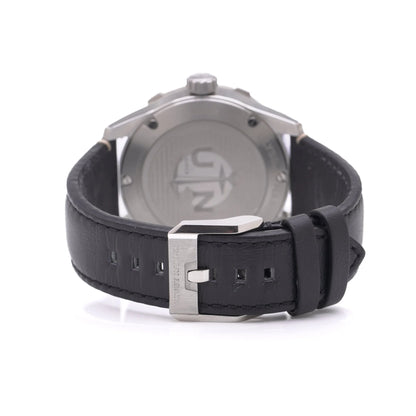 Ulysse Nardin stainless steel watch with black leather strap on a white background