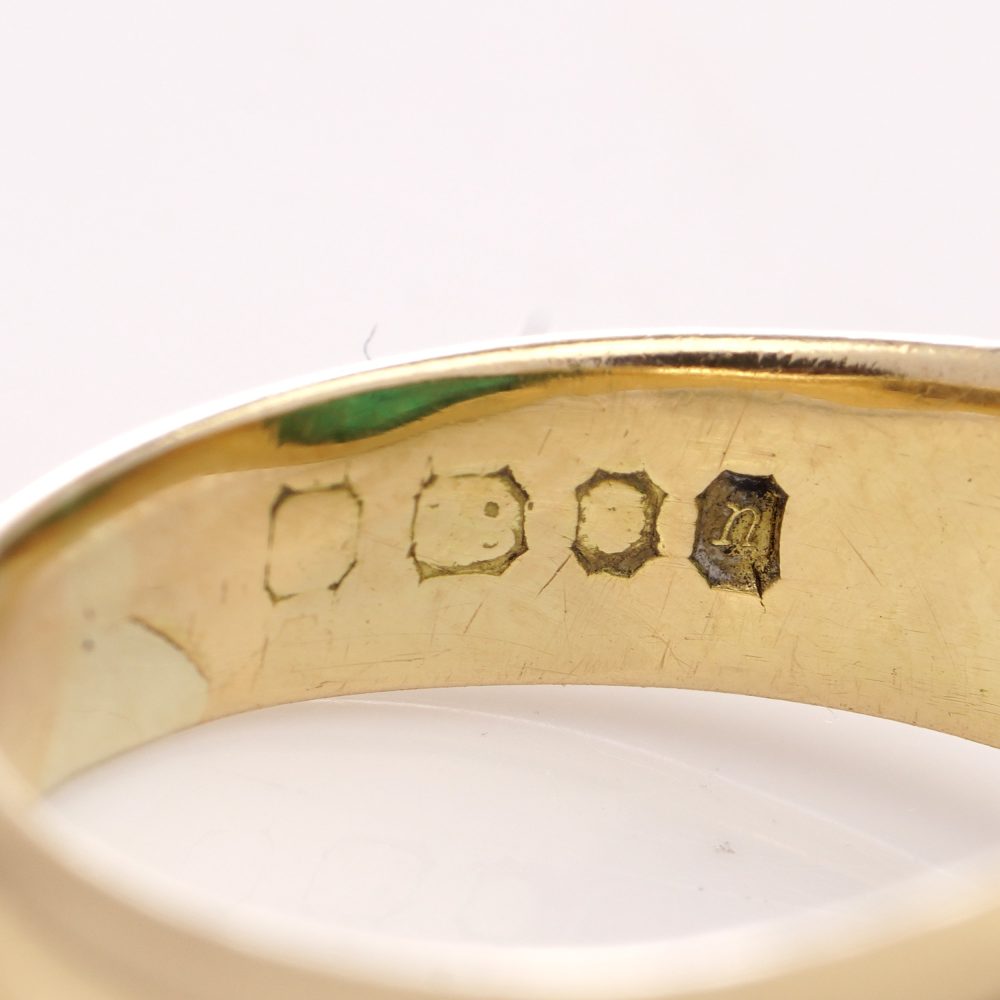 Vintage emerald dome ring set in gold.