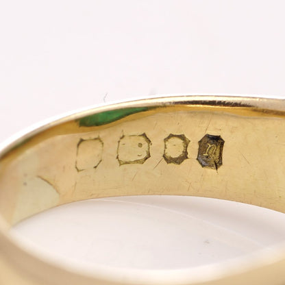 Vintage emerald dome ring set in gold.