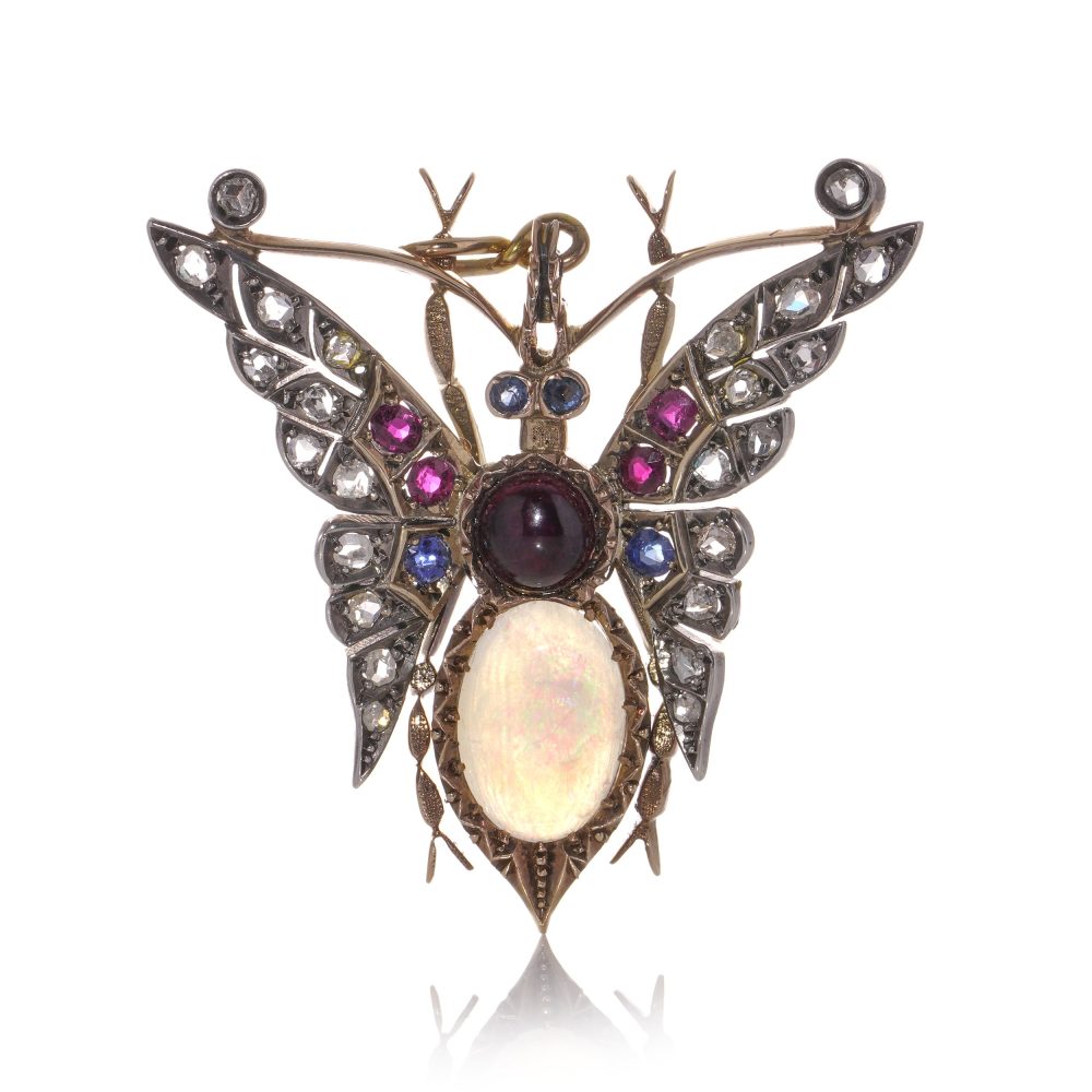 Victorian gold and silver butterfly brooch with gemstones.