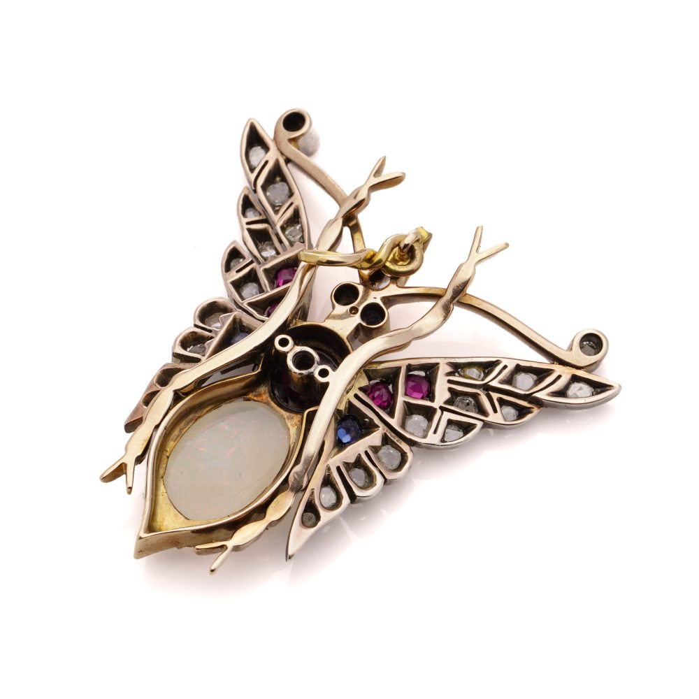 Victorian gold and silver butterfly brooch with gemstones.