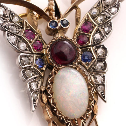 Victorian gold and silver butterfly brooch with gemstones.