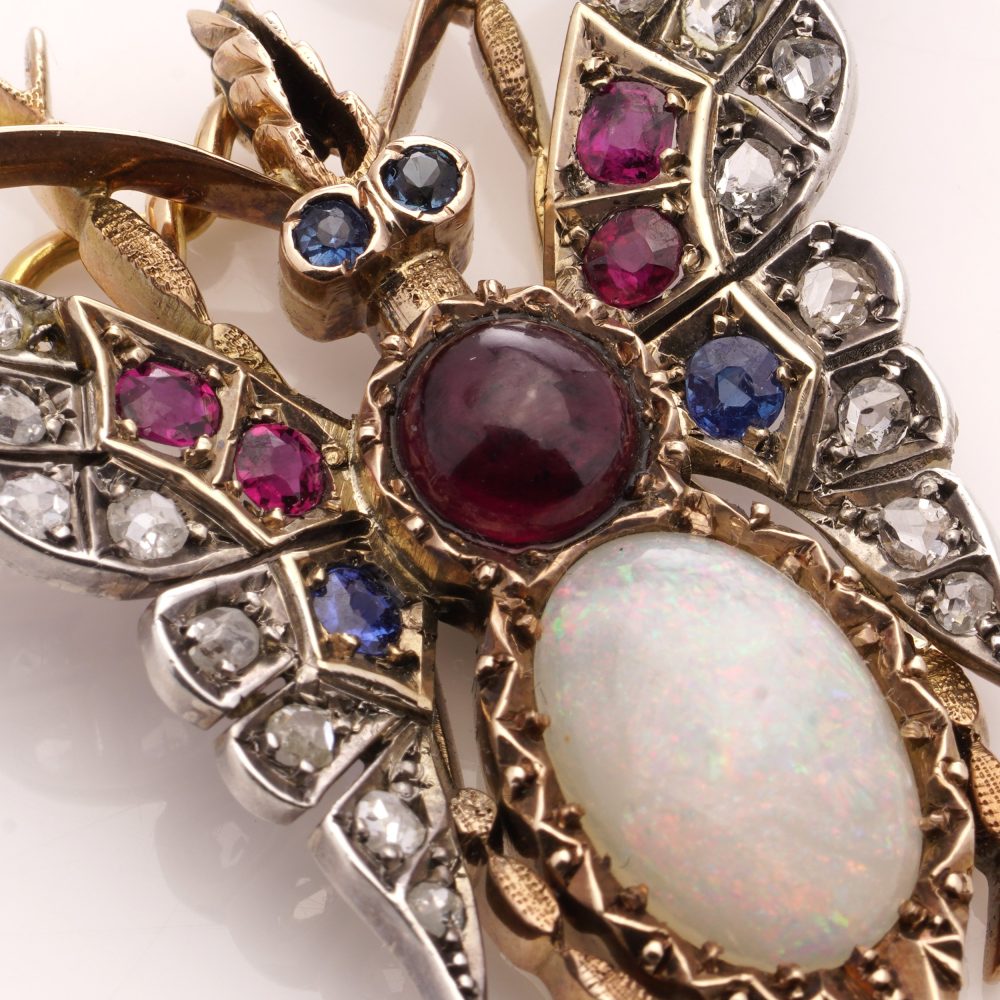 Victorian gold and silver butterfly brooch with gemstones.