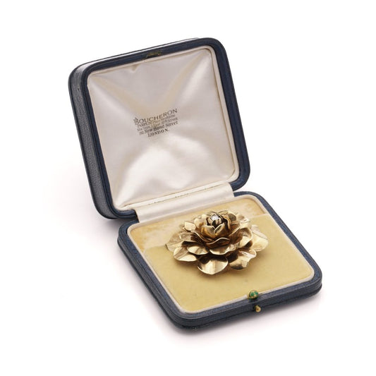 Boucheron vintage gold and diamond flower head brooch.