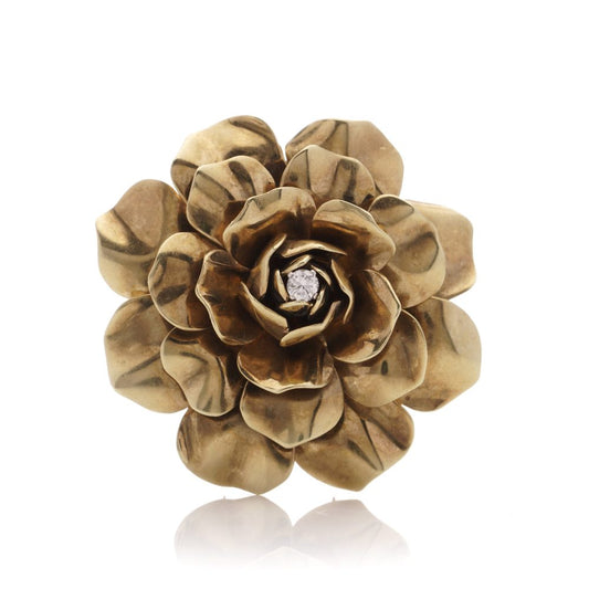 Boucheron vintage gold and diamond flower head brooch.