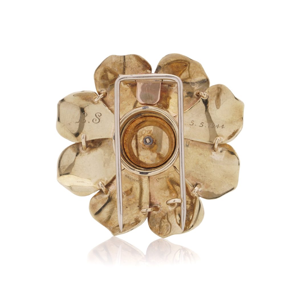 Boucheron vintage gold and diamond flower head brooch.