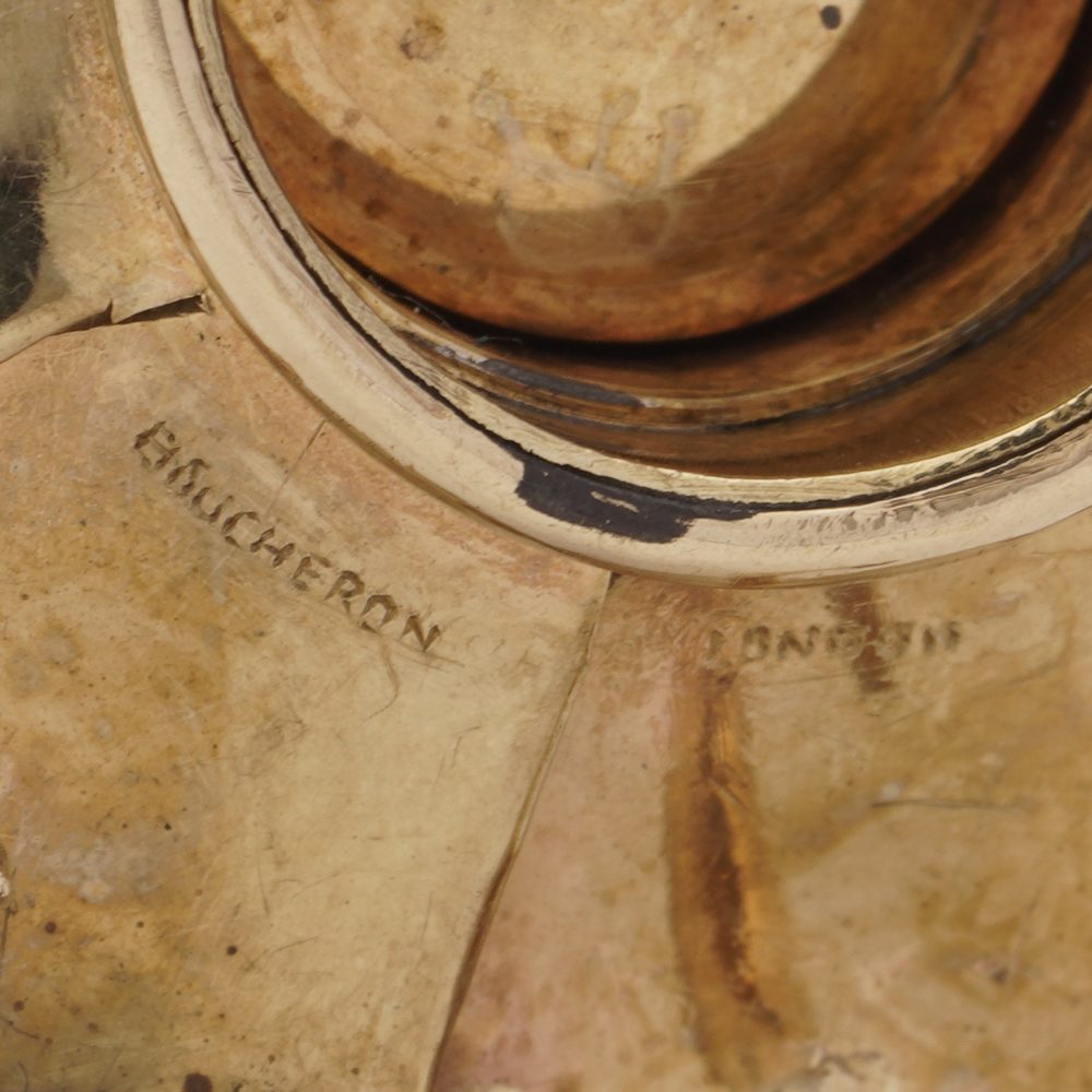 Boucheron vintage gold and diamond flower head brooch.