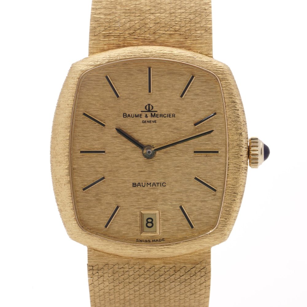 Vintage Baume et Mercier Baumatic 37082 Solid 18ct Yellow Gold Automatic Watch with champagne dial with date. Circa 1977
