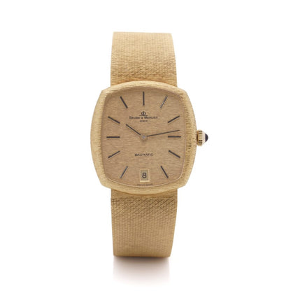 Vintage Baume et Mercier Baumatic 37082 Solid 18ct Yellow Gold Automatic Watch with champagne dial with date. Circa 1977