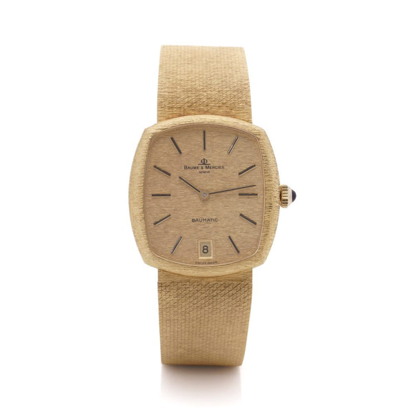 Vintage Baume et Mercier Baumatic 37082 Solid 18ct Yellow Gold Automatic Watch with champagne dial with date. Circa 1977