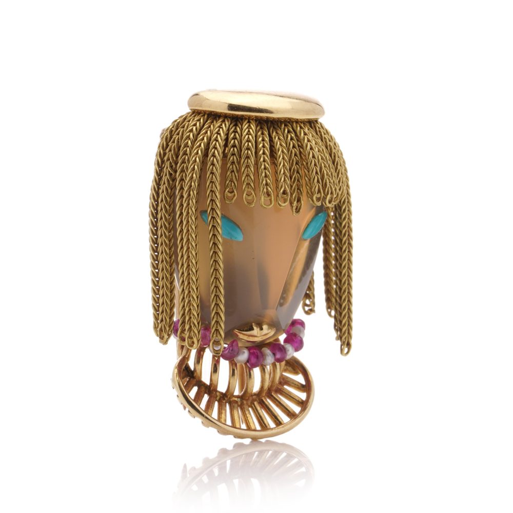 Gold brooch with chalcedony, turquoise, ruby and pearls.