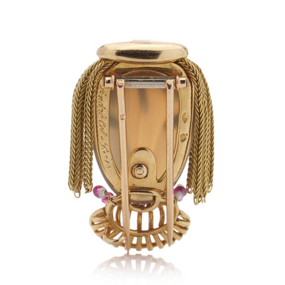 Gold brooch with chalcedony, turquoise, ruby and pearls.