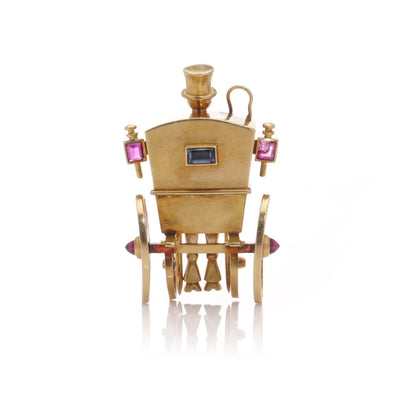 Mellerio gold sapphire and ruby carriage
