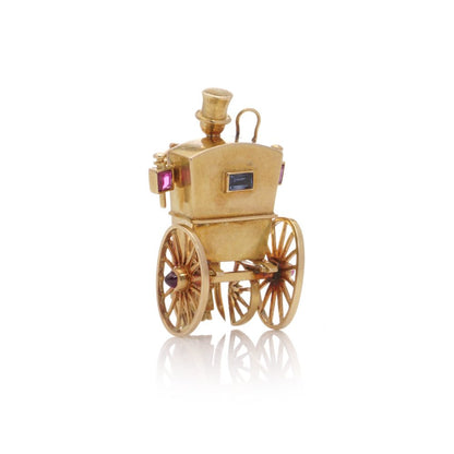 Mellerio gold sapphire and ruby carriage