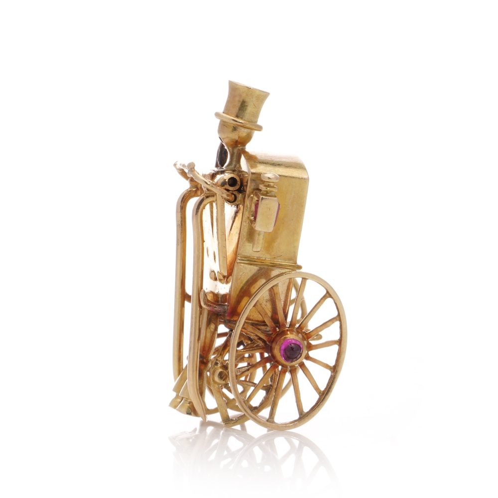 Mellerio gold sapphire and ruby carriage