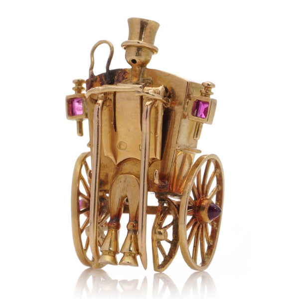 Mellerio gold sapphire and ruby carriage