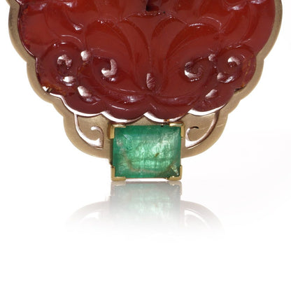 Chinese gold amber clip brooch with emeralds.