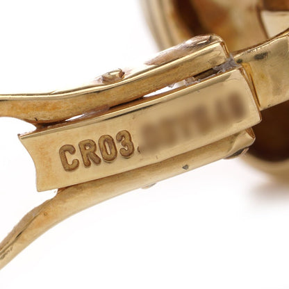 Van Cleef & Arpels clip-on earrings in gold with a heart-shaped design.