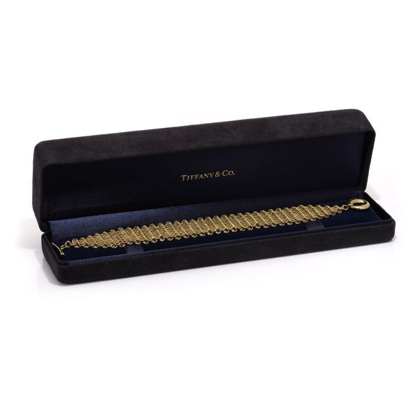 Tiffany & Co. gold multi-strand mesh bracelet.