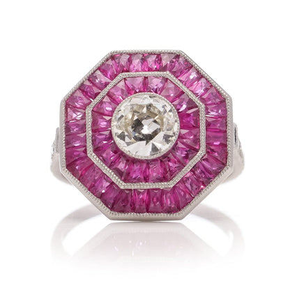 Diamond and ruby target cluster ring set in platinum made by JoAq. 