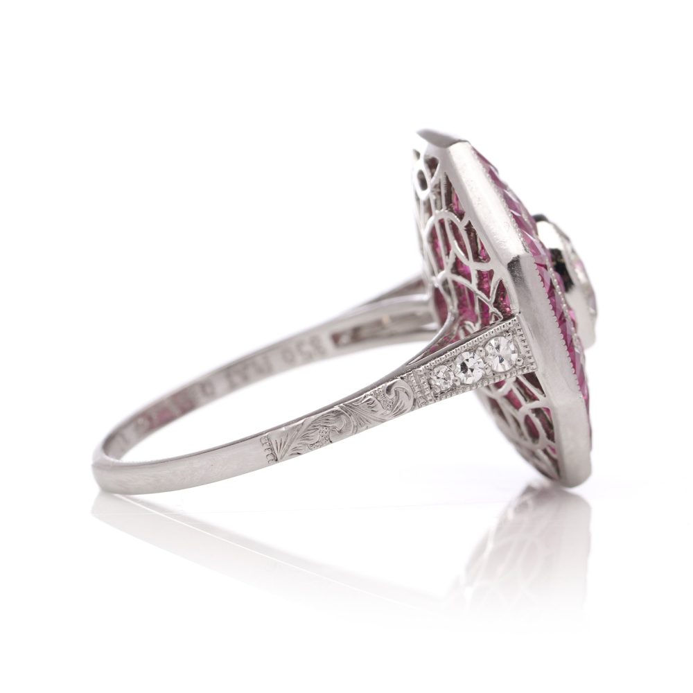 Diamond and ruby target cluster ring set in platinum made by JoAq. 