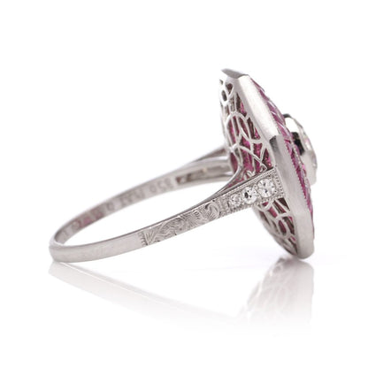 Diamond and ruby target cluster ring set in platinum made by JoAq. 