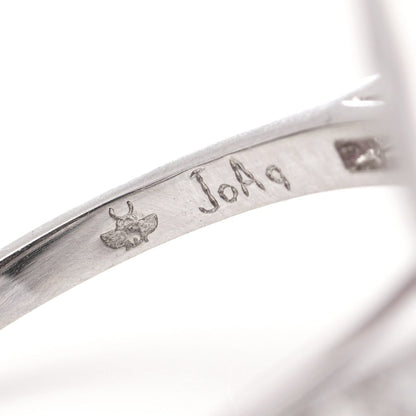 Diamond and ruby target cluster ring set in platinum made by JoAq. 