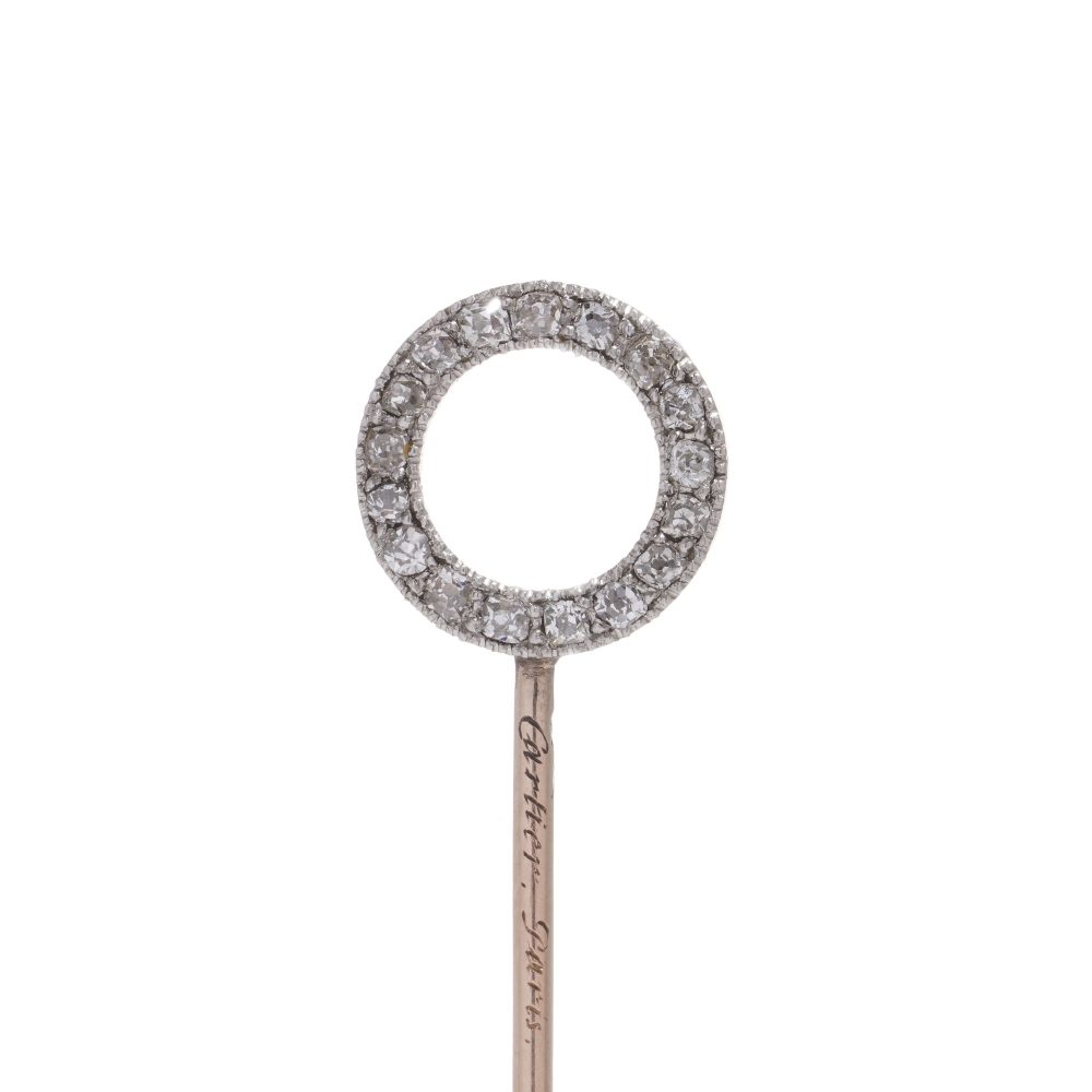 Cartier Art Deco gold and platinum ruby and diamond pin brooch.