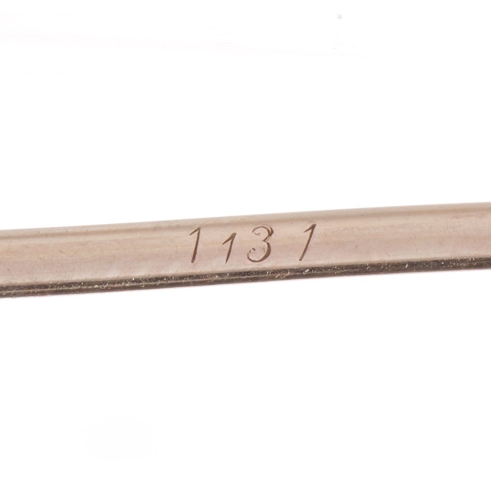 Cartier Art Deco gold and platinum ruby and diamond pin brooch.