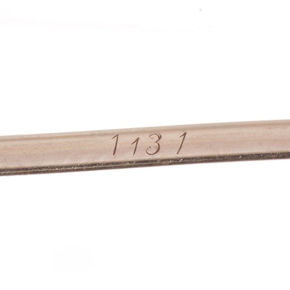 Cartier Art Deco gold and platinum ruby and diamond pin brooch.