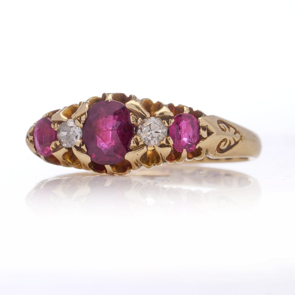 Antique gold five-stone ruby and diamond ring.