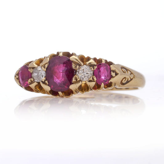 Antique gold five-stone ruby and diamond ring.