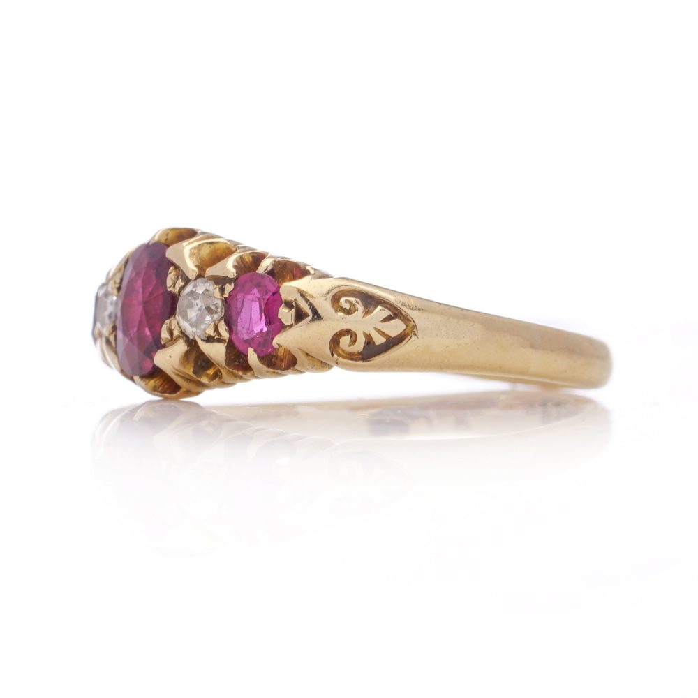 Antique gold five-stone ruby and diamond ring.