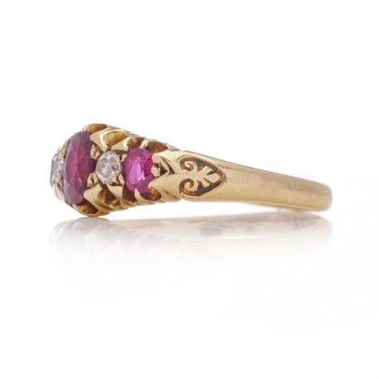 Antique gold five-stone ruby and diamond ring.