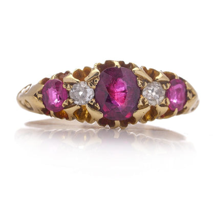 Antique gold five-stone ruby and diamond ring.