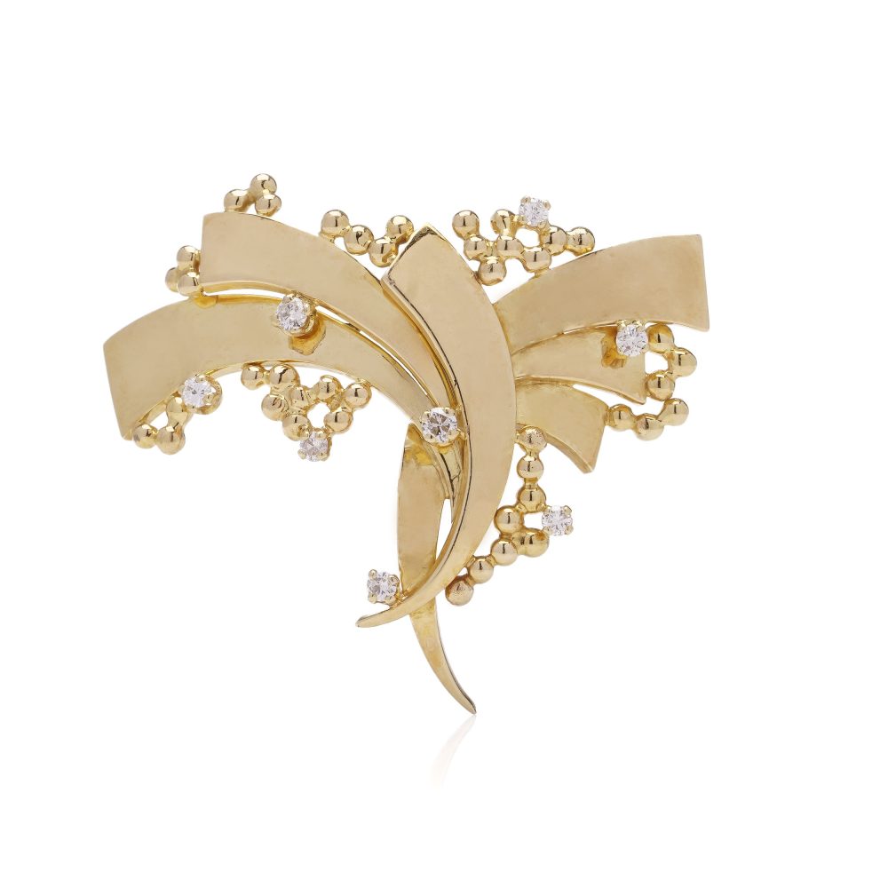 Vintage AMG abstract 18 carat yellow gold and diamond brooch.