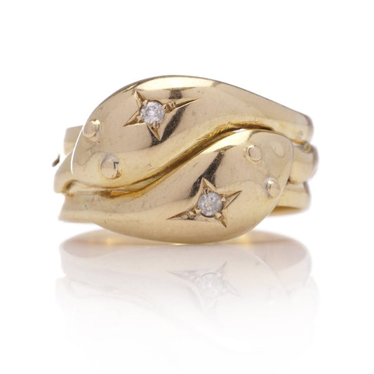 Antique gold men's snake band ring with diamonds.