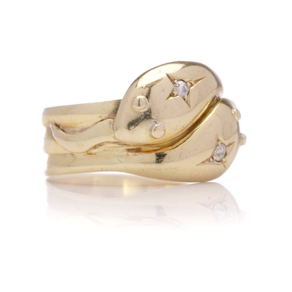 Antique gold men's snake band ring with diamonds.