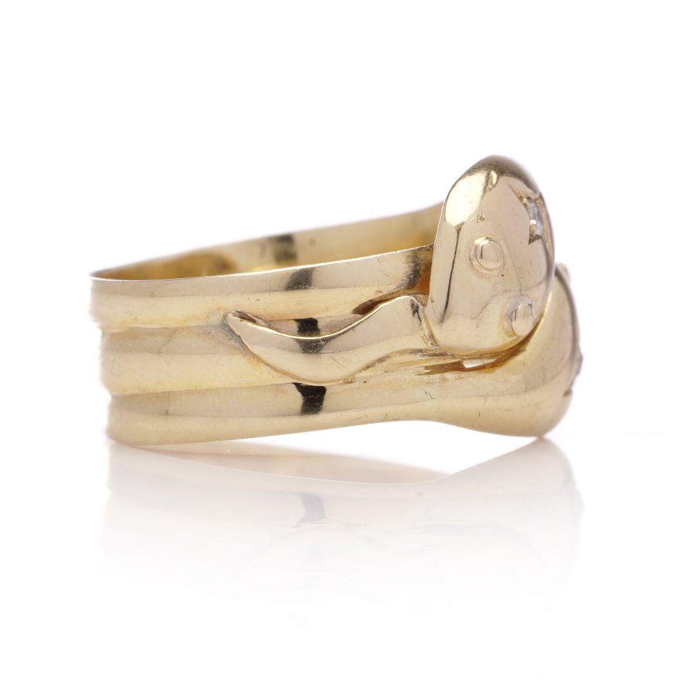 Antique gold men's snake band ring with diamonds.