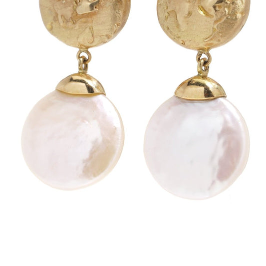 Freshwater pearl drop earrings in gold.