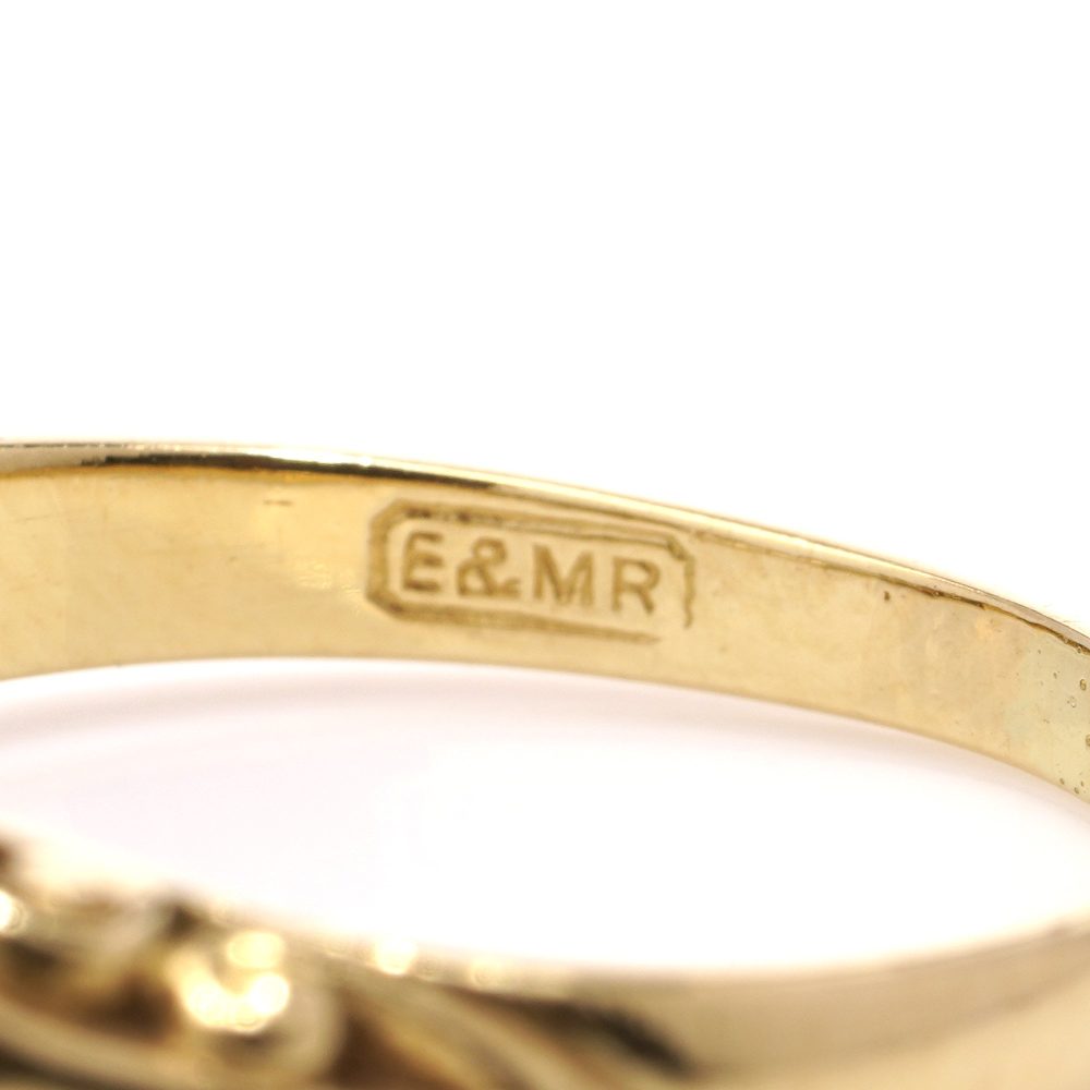 Three stone diamond ring in yellow gold